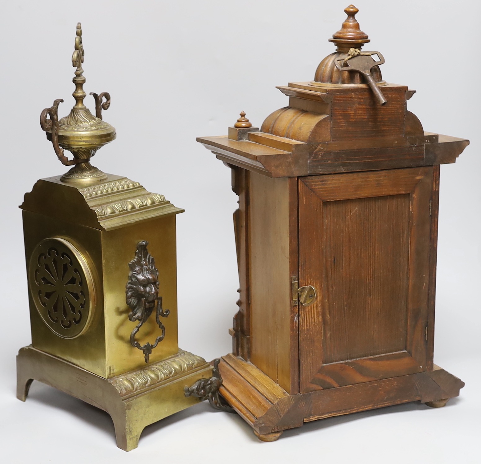 A late 19th century French brass mantle clock and another